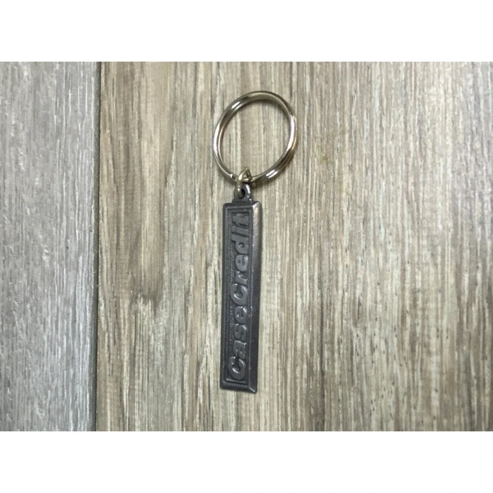 Vintage Case Credit Silver Tone Metal‎ Bar Keychain Embossed Industrial Keyring